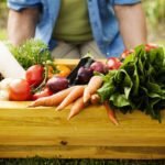 Wooden box filled fresh vegetables