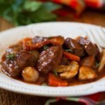 Close-up of Beef Bourguignon served on white plate